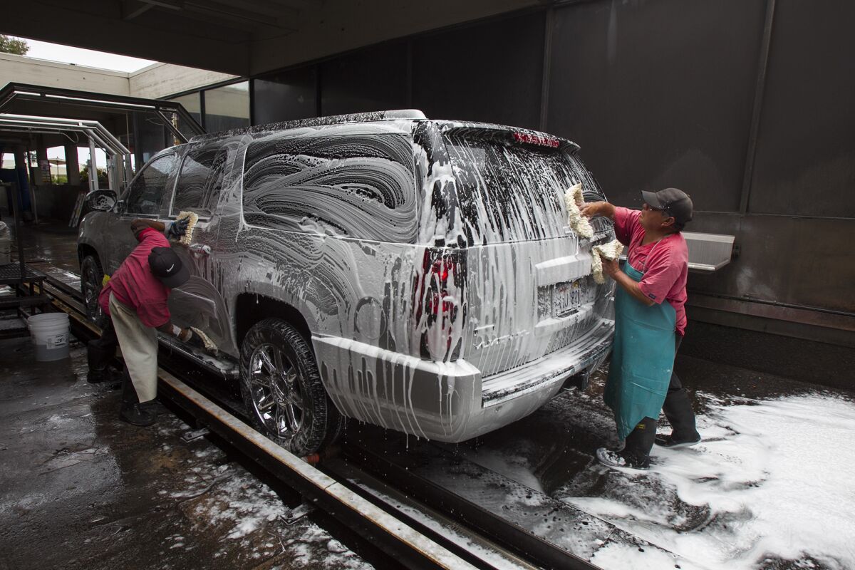 What is the difference between a basic car wash and a full-service car wash?